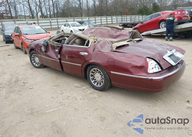 1LNHM82W12Y649216: 44453882