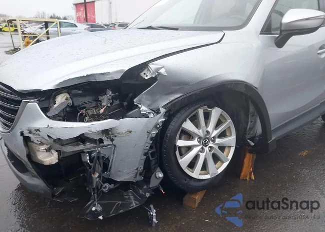 JM3KE4CYXG0710267: 44456063