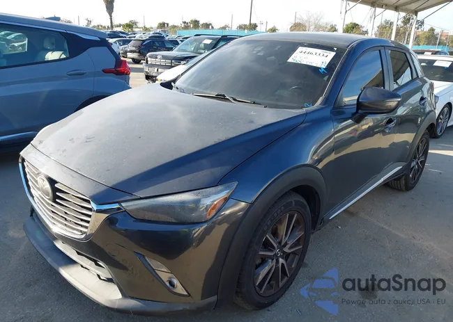 JM1DKDD7XG0134115: 44463334