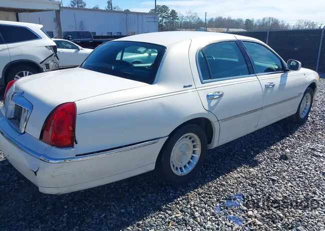 1LNHM82W0YY935910: 44475249