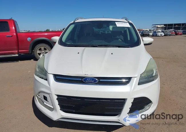 1FMCU0JX2EUE46868: 43566359