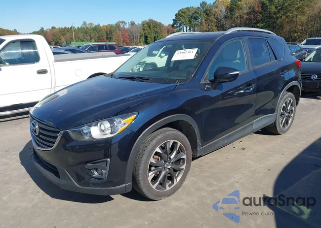 JM3KE2DY5G0715623: 43582561