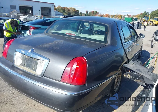 1LNFM82W1WY734800: 43583231