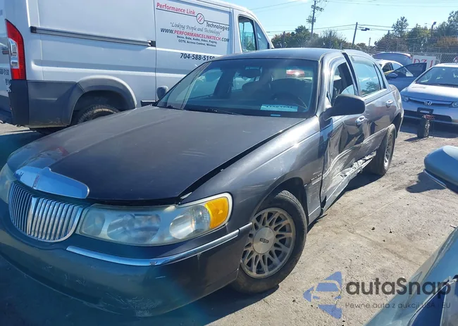 1LNFM82W1WY734800: 43583231