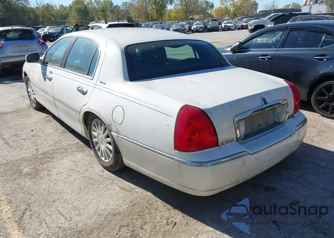 1LNHM82W33Y694322: 43591444