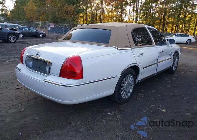 1LNHM81W34Y679984: 43599304