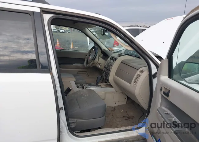 1FMCU03G99KA26992: 43646560