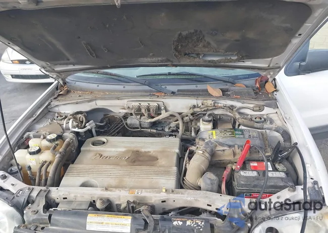 1FMYU49H17KA99459: 43663421