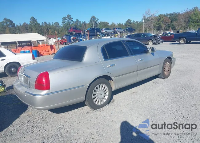 1LNHM82W73Y650940: 43686744