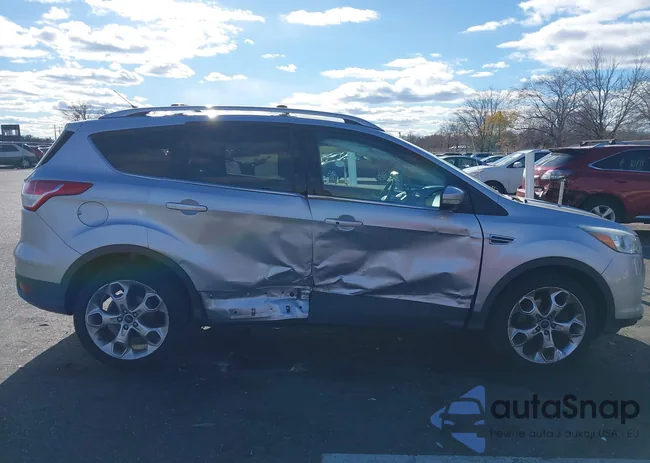 1FMCU9JX0GUA01990: 43696260