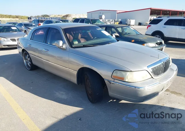 1LNHM81W06Y618904: 43701569