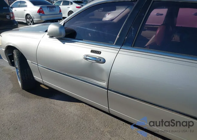 1LNHM81W06Y618904: 43701569