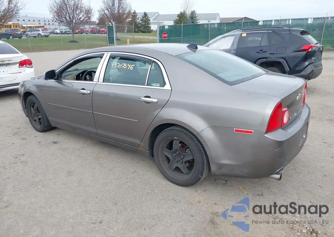 1G1ZB5E0XCF333436: 43707346