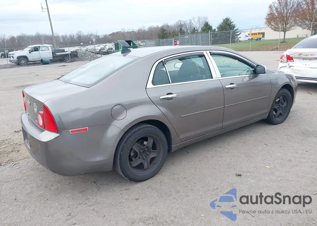 1G1ZB5E0XCF333436: 43707346