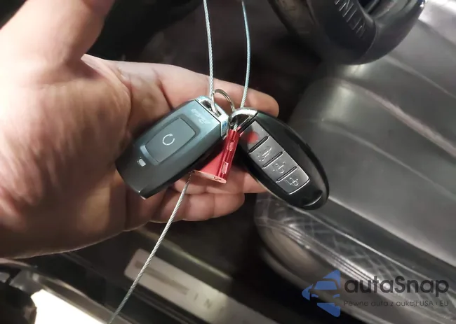 JN8CS1MW2FM482083: 43713816