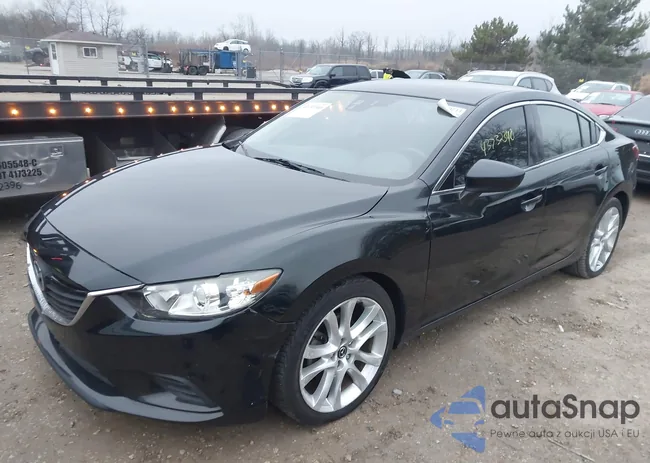 JM1GJ1T56E1105958: 43732340