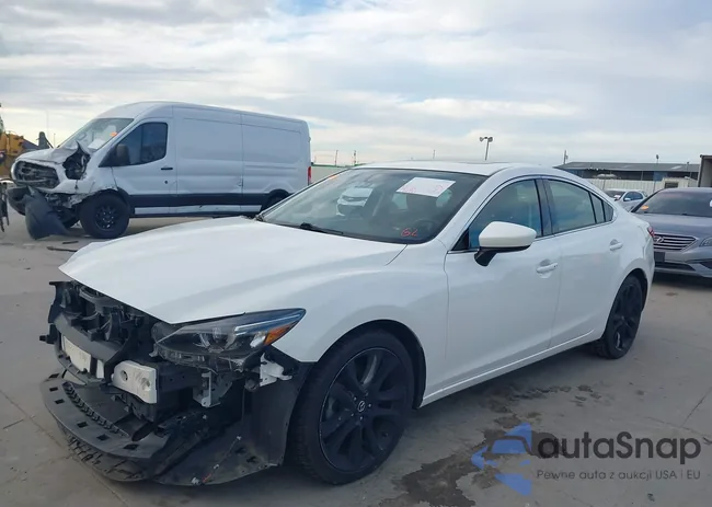 JM1GJ1W53G1407108: 43792143