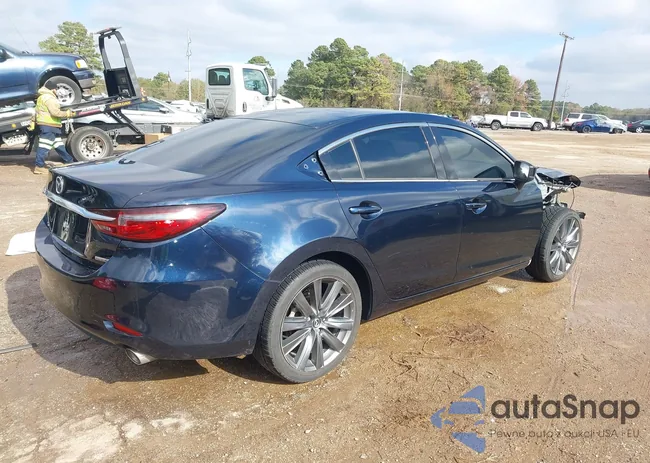 JM1GL1VM1M1602414: 43815889