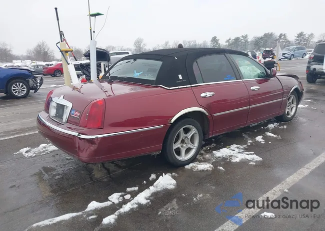 1LNFM82W2WY619543: 43832059