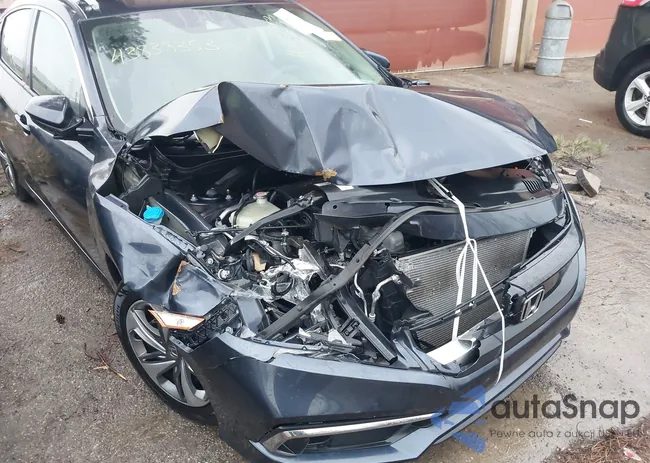 2HGFC2F63LH545684: 43838353