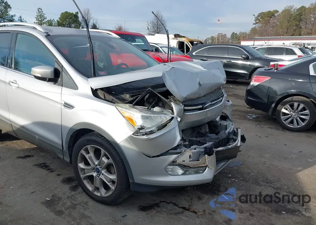 1FMCU0JX3EUA78071: 43861551