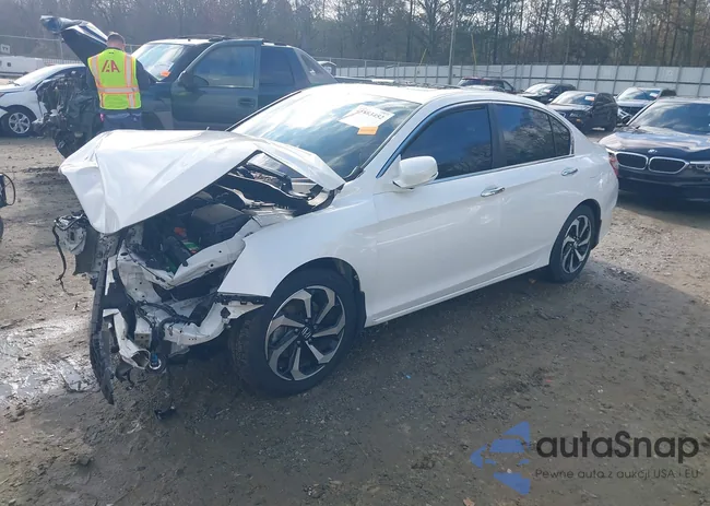 1HGCR2F98GA114385: 43883452