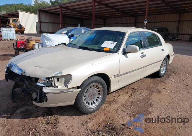 1LNHM83W1YY903885: 44547848