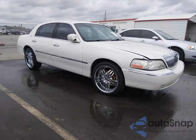 1LNHM82W63Y660696: 44582353