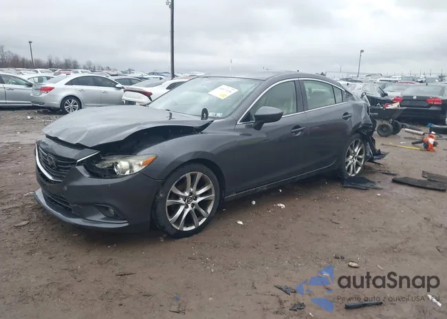 JM1GJ1W65E1136932: 44611636