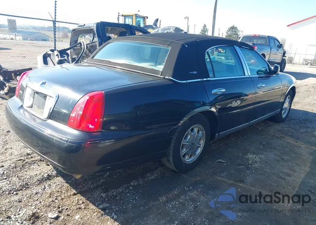 1LNFM82W6WY711741: 44664098