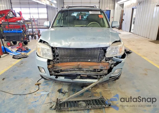 4M2CU87709KJ11758: 74992655