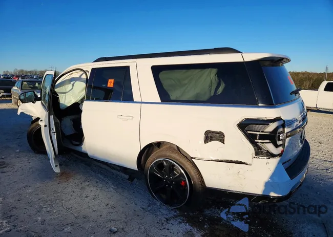 1FMJK1KG1REA51145: 98883995