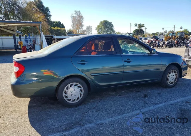 JTDBE32KX20004652: 73031735