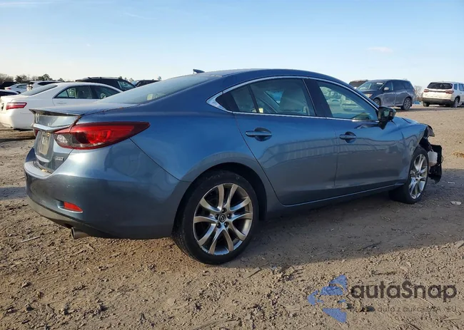 JM1GJ1W56G1426686: 98999215