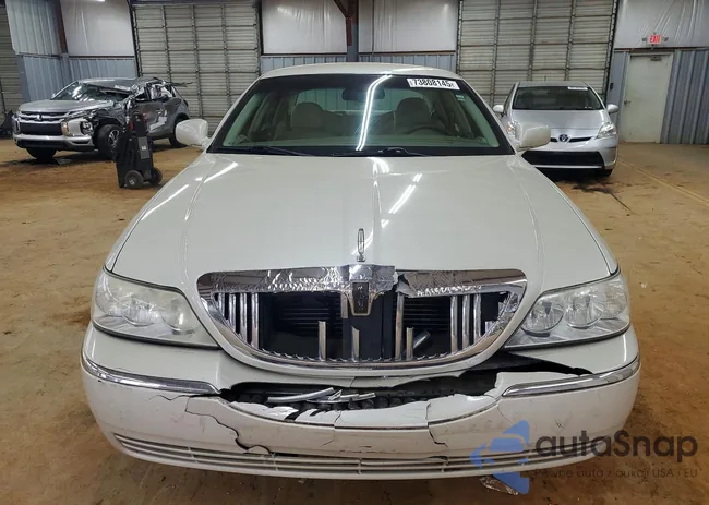 1LNHM81W55Y611638: 73808145