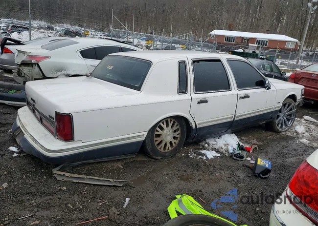 1LNLM82W2TY724422: 74372345