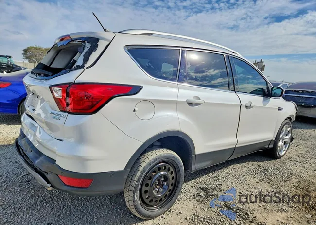 1FMCU0J99KUA26652: 76465095