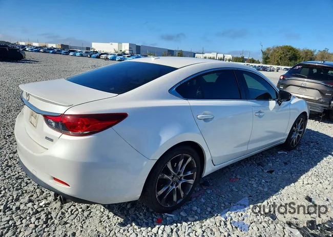 JM1GJ1W6XE1146436: 79744385