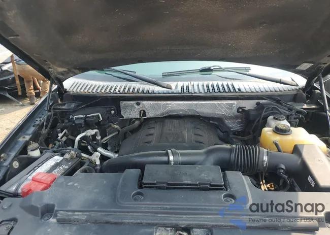 1FMJK2AT2FEF16421: 67236705