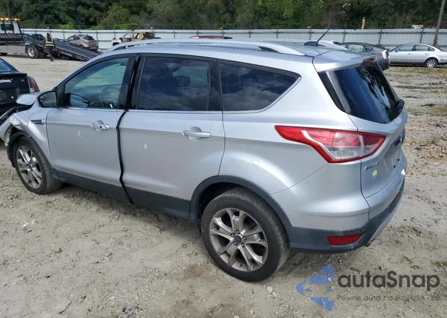 1FMCU0J99EUE07860: 71030585