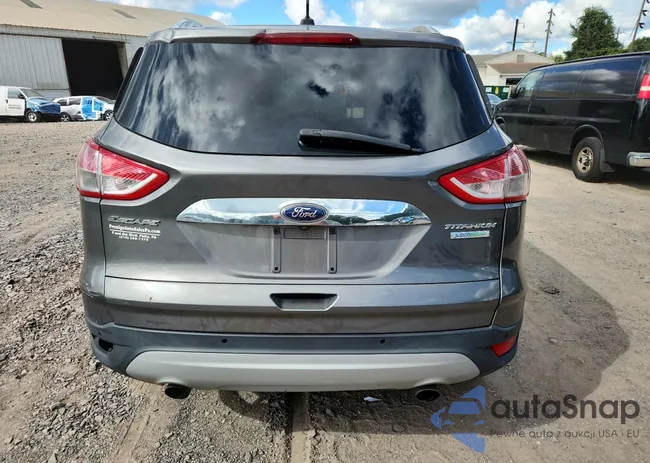 1FMCU0JX9EUD66953: 71062735