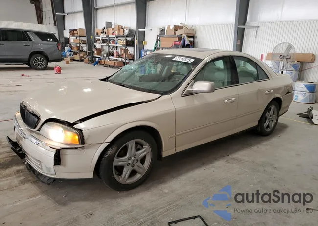 1LNHM87A12Y702784: 71110525