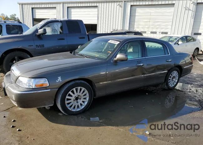 1LNHM82W73Y680066: 70675933