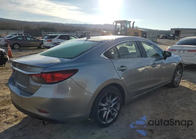 JM1GJ1W68E1124676: 79200573